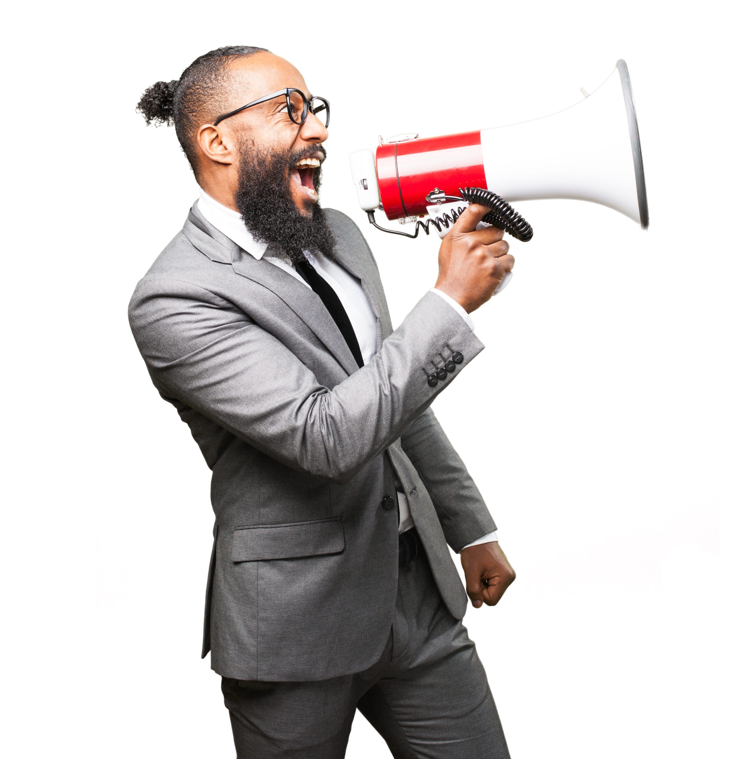 Young male adult in a suit using a megaphone