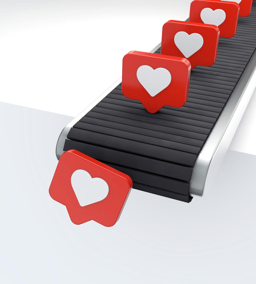 A moving conveyor belt with a blank background. Social media hearts, representing likes, are coming down the conveyor belt.